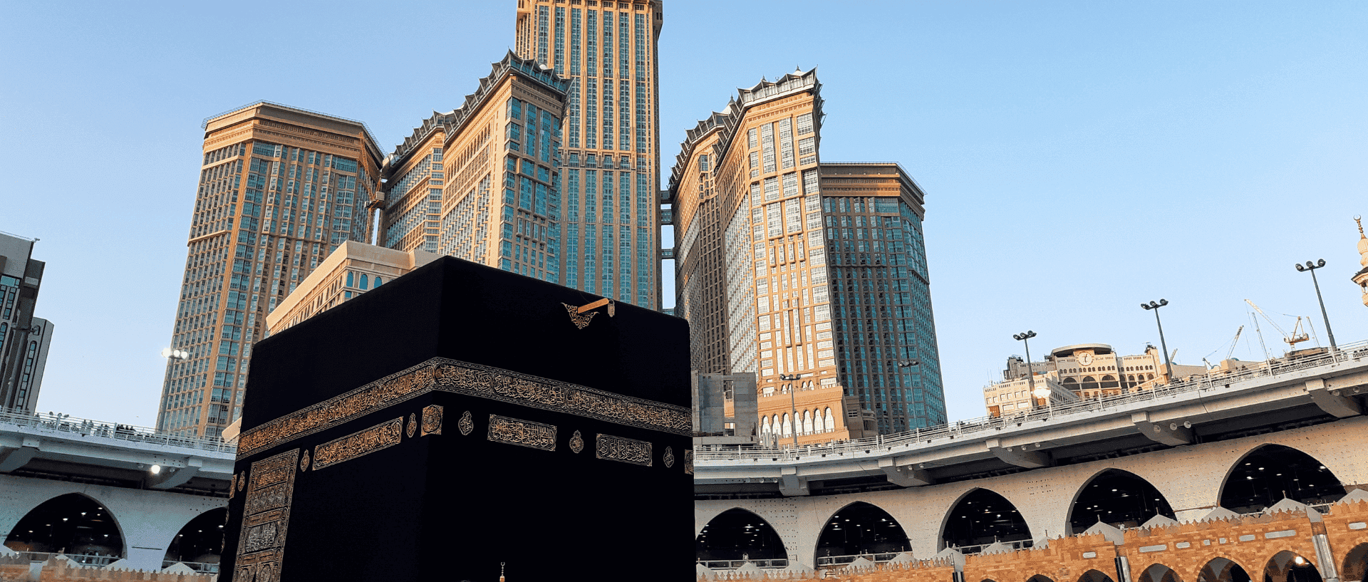 The Kaaba with the Makkah Clock Tower hotels behind